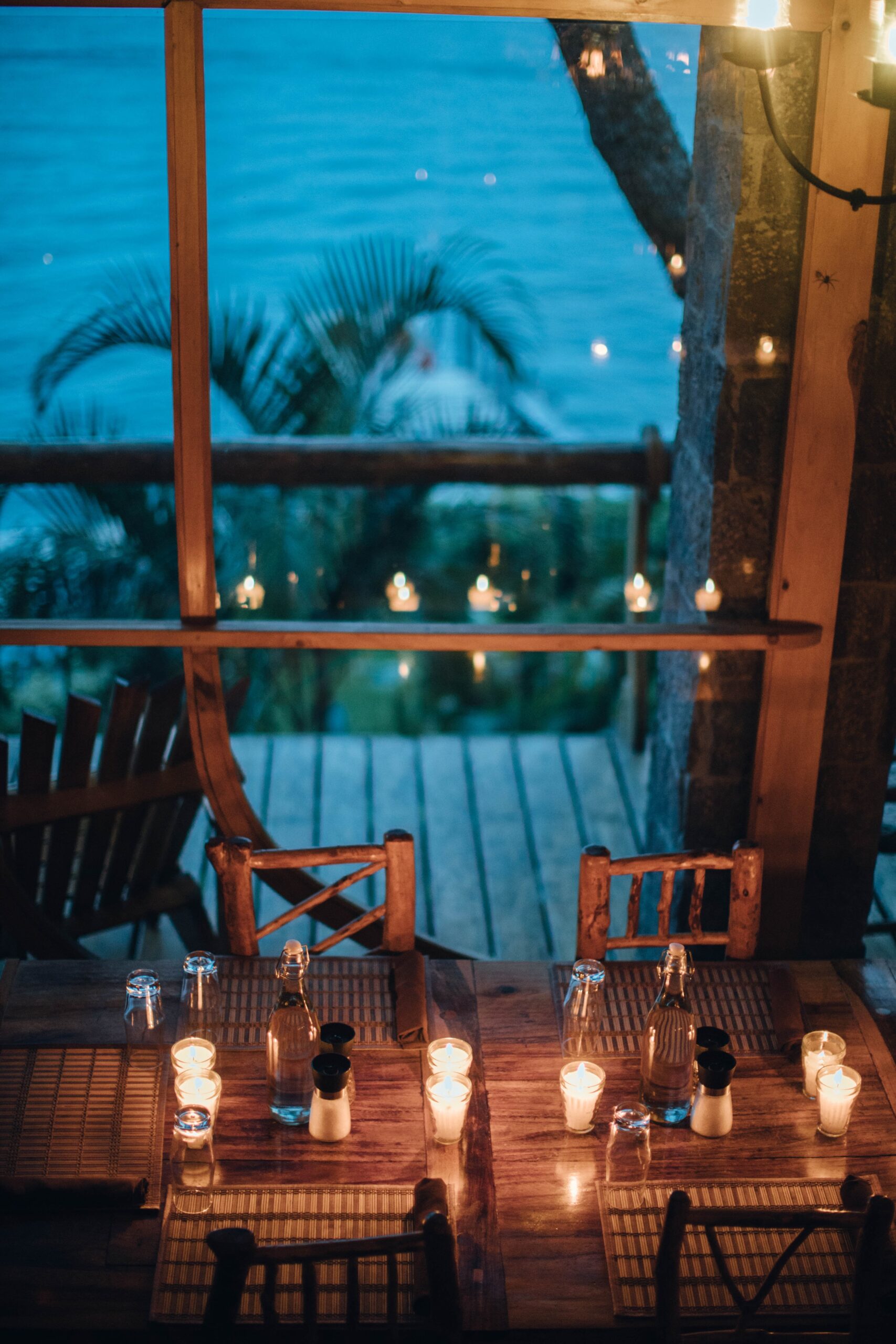 white candles on brown Vida Plena Y Salud white candles on brown wooden table